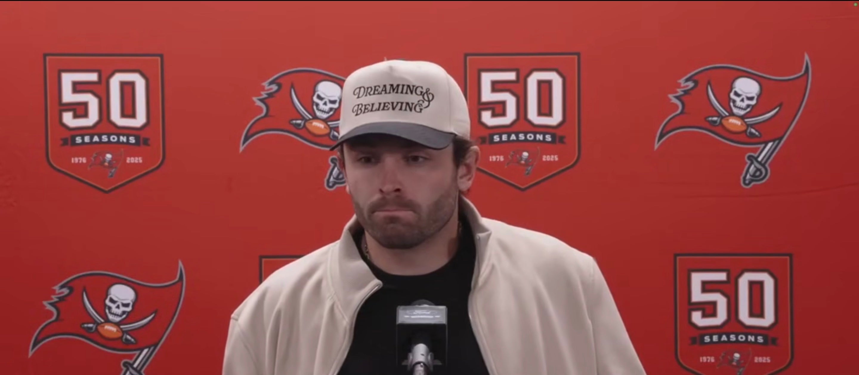 Baker Mayfield talks with reporters after the Bucs' loss to the Lions.